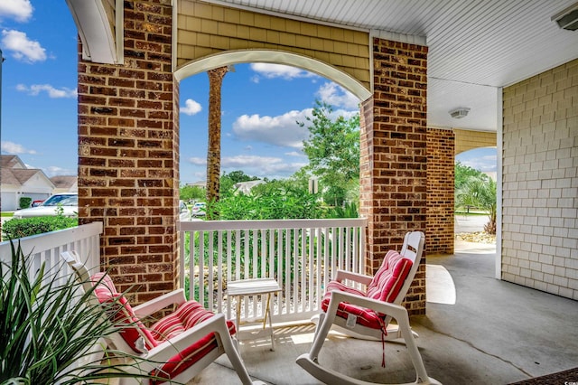 view of patio / terrace with a balcony