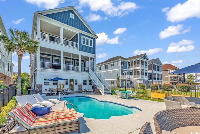 view of pool with a patio