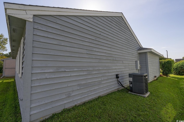 213 Birkdale Ln, Myrtle Beach, SC 29588 - view of home's exterior featuring a central AC unit and a lawn