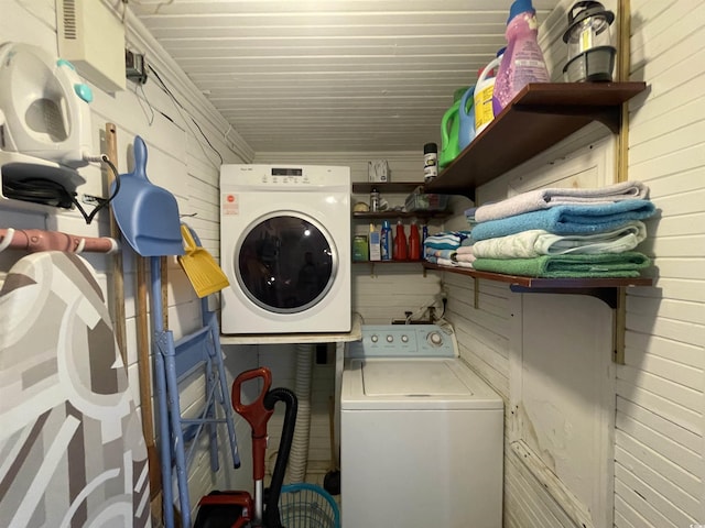 laundry room featuring laundry area and washer / dryer