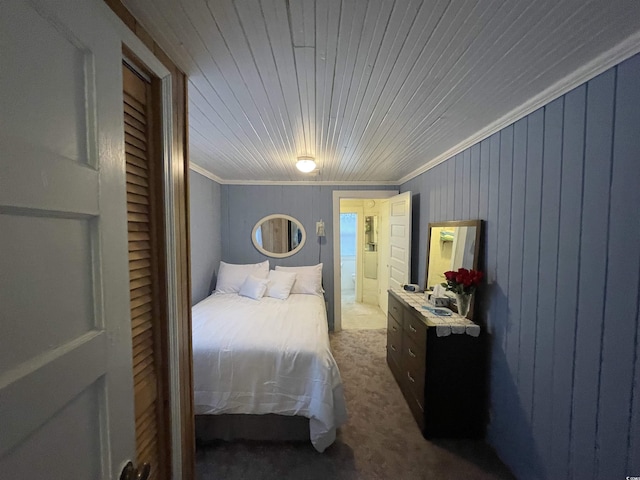 bedroom featuring carpet floors, ornamental molding, and wooden ceiling