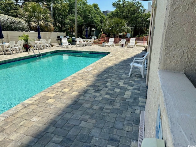 view of pool with a patio