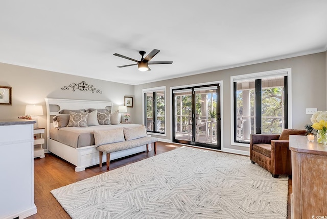 bedroom with access to outside, ceiling fan, and light hardwood / wood-style floors