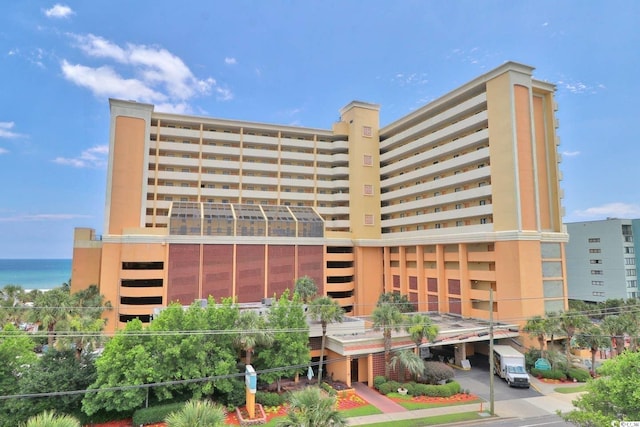 view of building exterior with a water view