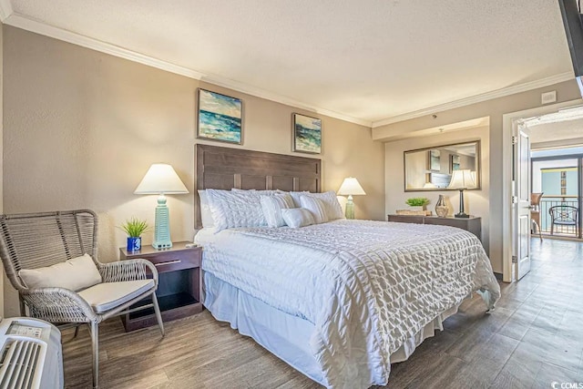 bedroom featuring dark hardwood / wood-style floors and crown molding