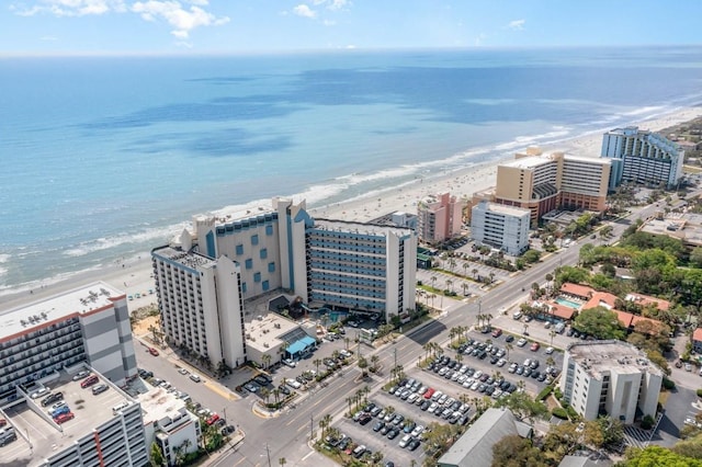 drone / aerial view with a view of the beach and a water view