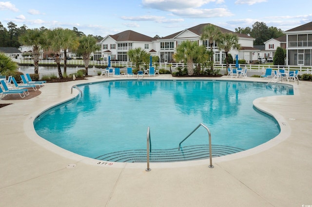 view of swimming pool featuring a patio