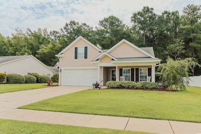 view of front of home with a garage and a front yard