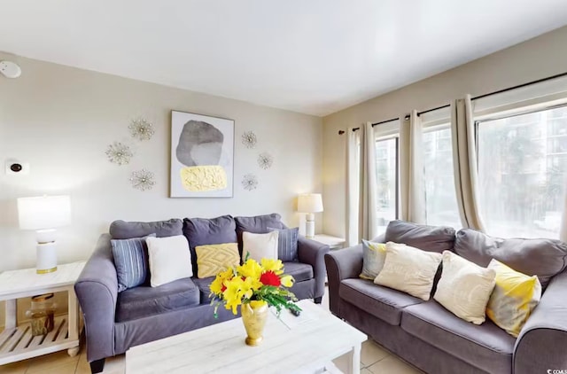 playroom featuring a textured ceiling and concrete floors