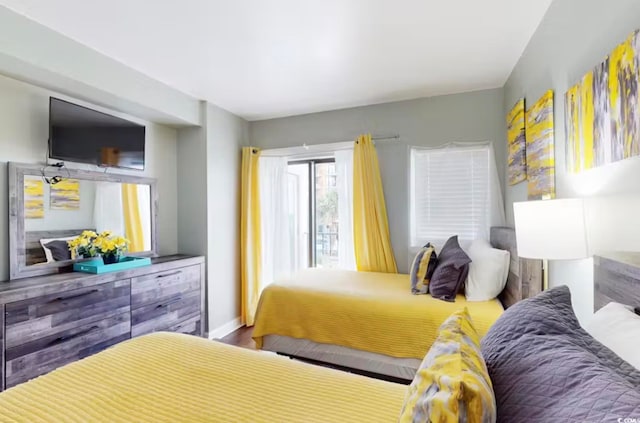 bedroom with wood-type flooring