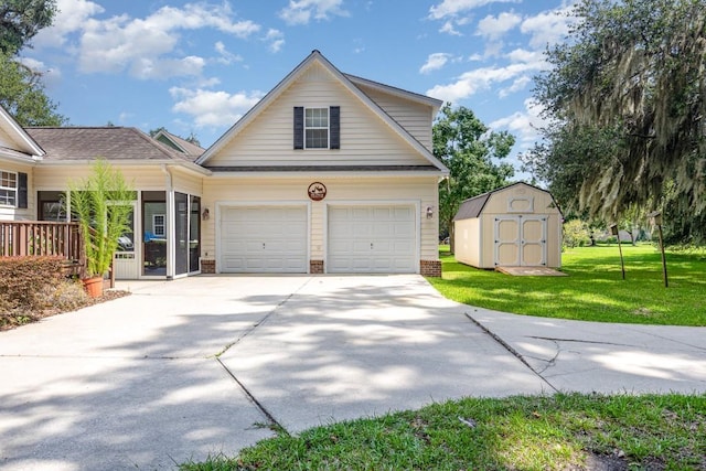 view of front of home with a front yard and a storage unit