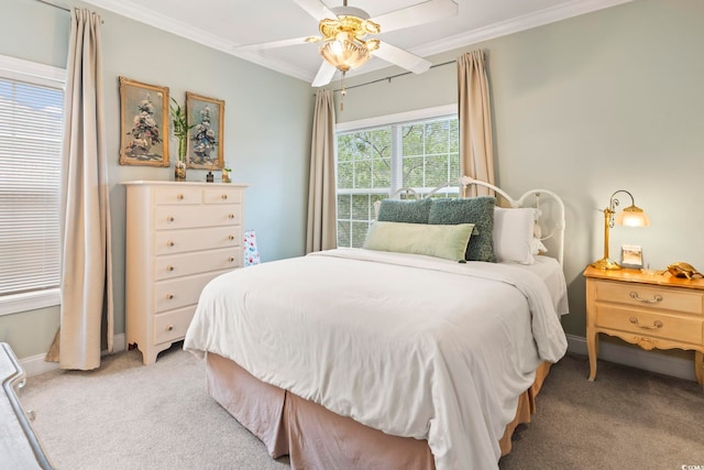 bedroom with ceiling fan, light colored carpet, and ornamental molding