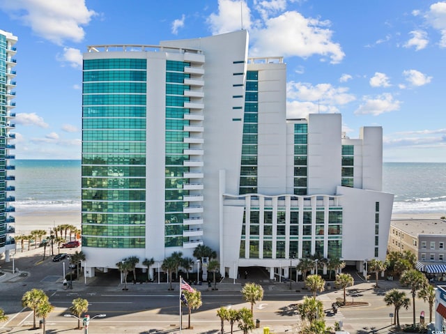 201 S Ocean Blvd Unit 1005, Myrtle Beach, SC 29577 - view of building exterior with a water view and a beach view
