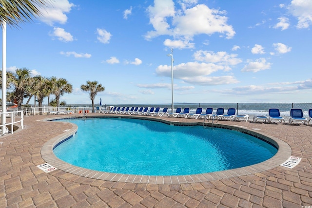 201 S Ocean Blvd Unit 1005, Myrtle Beach, SC 29577 - pool featuring a patio area and fence