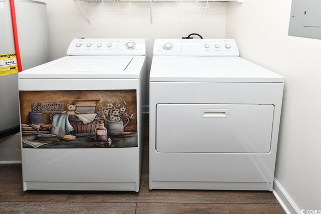 laundry room with water heater and independent washer and dryer