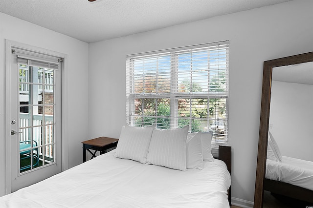 bedroom featuring a textured ceiling