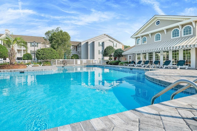 view of pool featuring a patio area