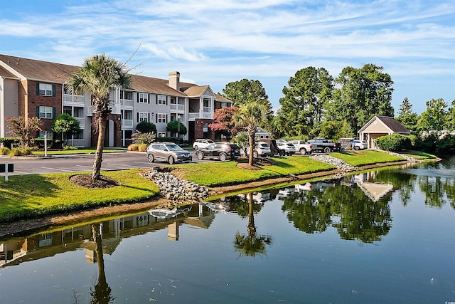 view of property's community with a water view