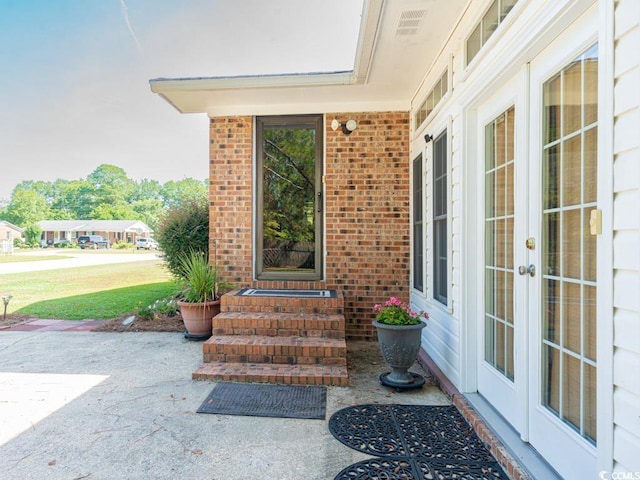 doorway to property with french doors