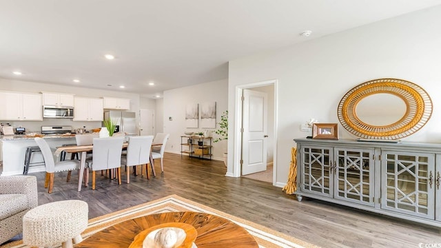 dining room with hardwood / wood-style floors