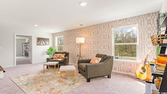 living area featuring carpet floors