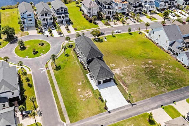 birds eye view of property with a residential view