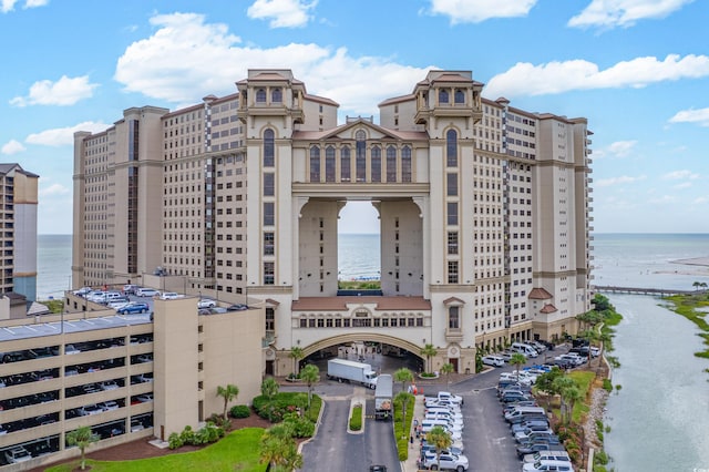 view of building exterior with a water view