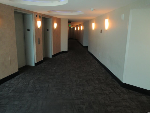 corridor featuring elevator