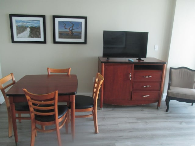 dining area featuring light hardwood / wood-style flooring