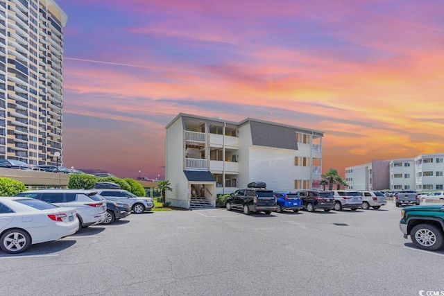 view of outdoor building at dusk