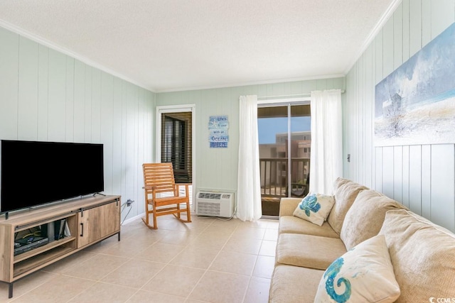 living area featuring light tile patterned floors, ornamental molding, and a wall mounted AC