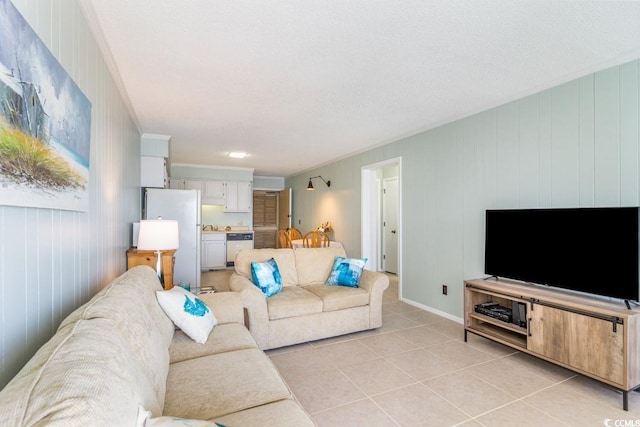 tiled living room featuring crown molding