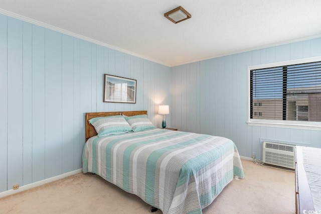 bedroom featuring crown molding, a wall mounted AC, and light colored carpet