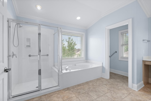 bathroom featuring ornamental molding, a stall shower, a garden tub, and baseboards