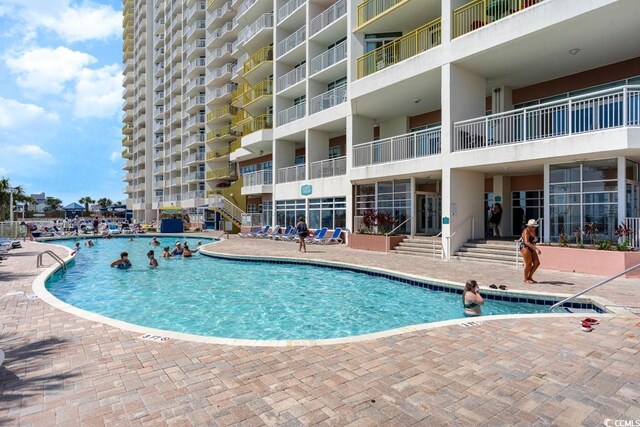 2701 S Ocean Blvd Unit 710, North Myrtle Beach, SC 29582 - community pool with a patio