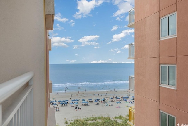 property view of water featuring a beach view