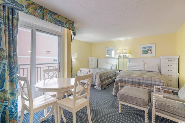 2701 S Ocean Blvd Unit 710, North Myrtle Beach, SC 29582 - bedroom featuring carpet and a textured ceiling