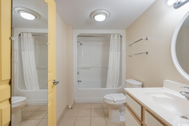 full bathroom featuring tile patterned flooring, shower / bath combo with shower curtain, toilet, and vanity