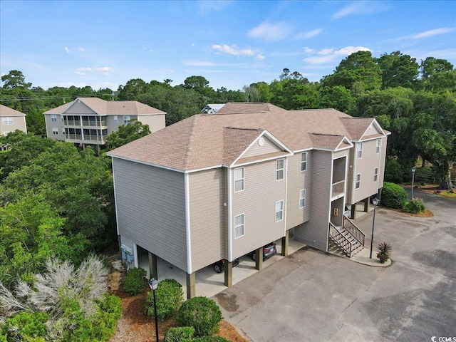 view of front of house with a carport