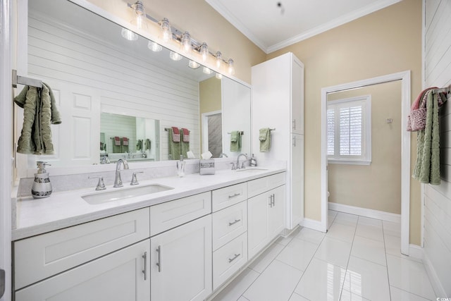 bathroom featuring ornamental molding, tile patterned flooring, and vanity