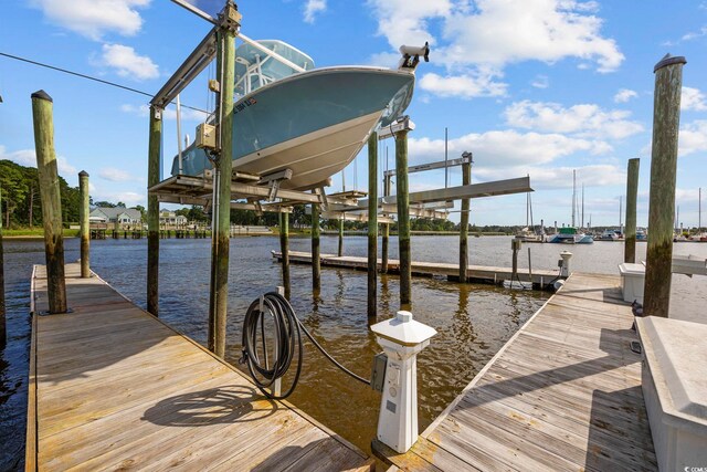 view of dock featuring a water view