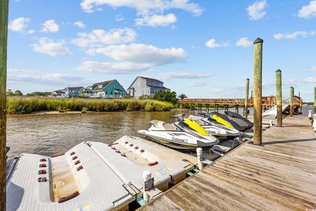 view of dock featuring a water view