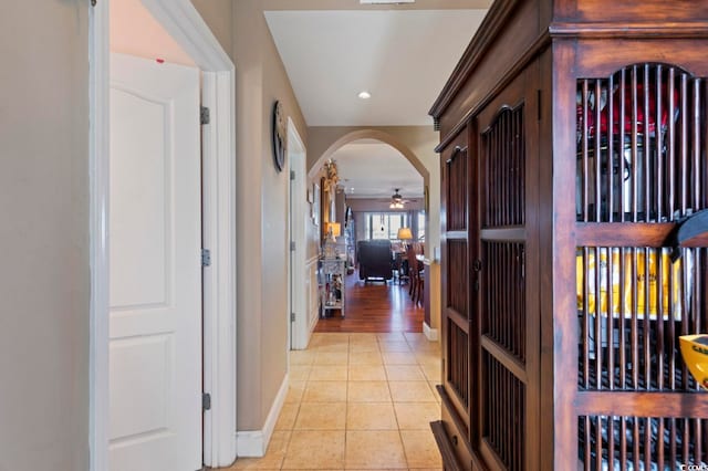 hall with light tile patterned flooring