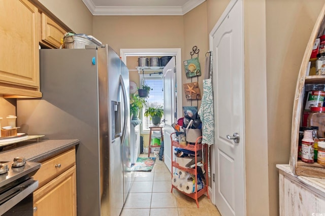 kitchen with ornamental molding, light brown cabinetry, light tile patterned floors, and stainless steel fridge with ice dispenser