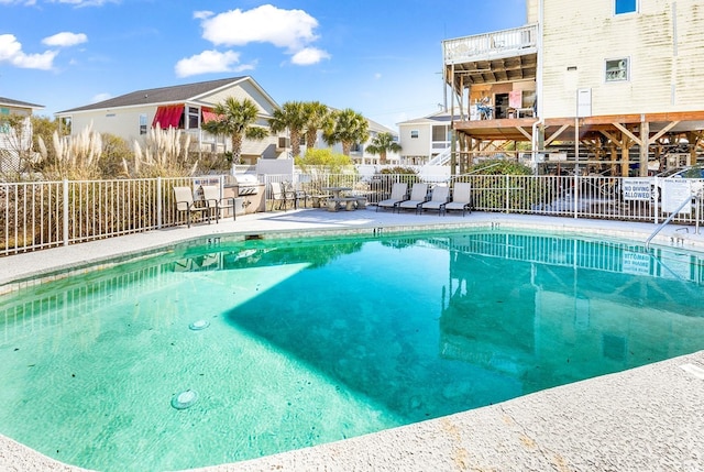 view of pool featuring a patio