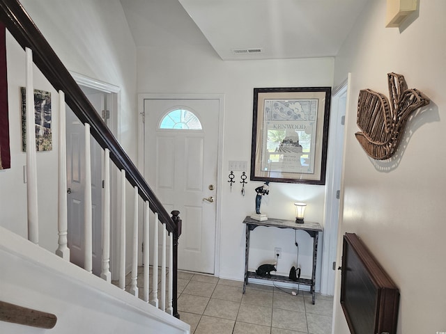 view of tiled foyer entrance