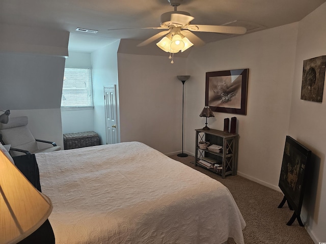 bedroom featuring dark carpet and ceiling fan