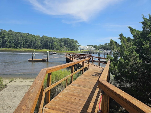 view of dock with a water view