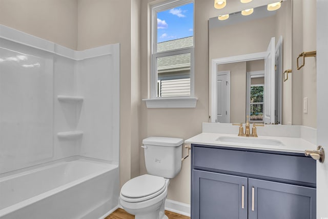 full bathroom with shower / bathing tub combination, vanity, and toilet