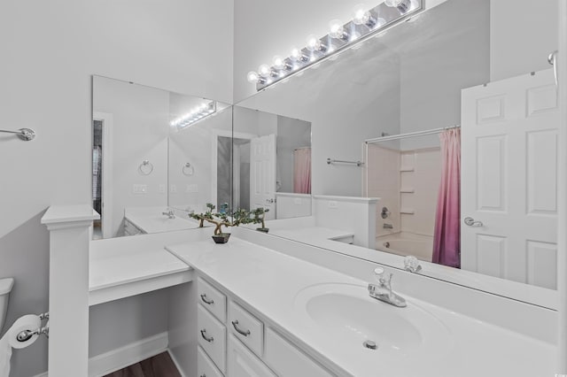 bathroom with shower / bath combo, vanity, and hardwood / wood-style floors